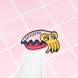 Cute cartoon squid enamel pin with text design, detailed close-up shot of creative cute badge jewelry.