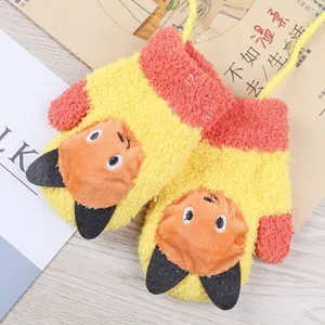 Cozy winter kids fluffy coral fleece gloves detail view with cute cartoon animal design.