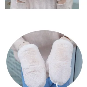 Detailed view of cozy winter warm plush mittens with hanging string and cute button detail.
