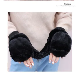 Detailed view of women winter warm black plush mittens with hanging rope cozy design.
