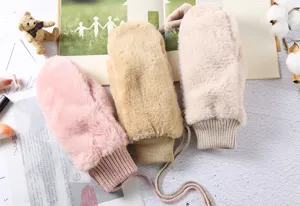 Cozy winter plush mittens for women, warm fluffy thick gloves with hanging string for cold days.