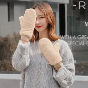 Winter warm plush mittens for women, thick fuzzy cold-proof gloves with hanging strap.