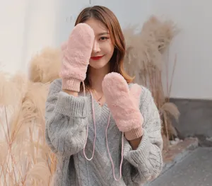 Cozy winter pink fluffy plush mittens with lanyard, soft fleece-lined warm gloves for women.