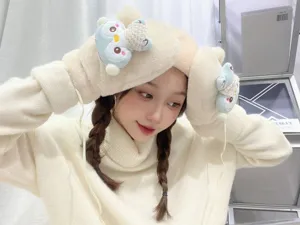 Detailed shot of plush winter hat with cute penguin decor, soft fleece warmth for cold days.
