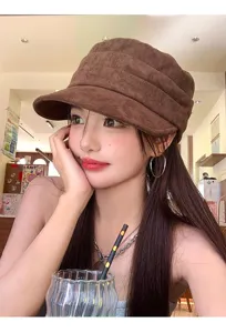 Stylish brown suede newsboy cap for women, retro pleated flat top hat, perfect fashion accessory.