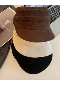 Suede octagonal hat detail showing soft pleated texture, multi-color stacked design.