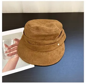 Brown suede pleated hat detail, stylish retro flat top design with a cute heart metal stud.