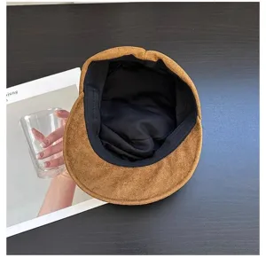 Detailed view of women retro brown suede octagonal hat, classic British fashion newsboy cap design.
