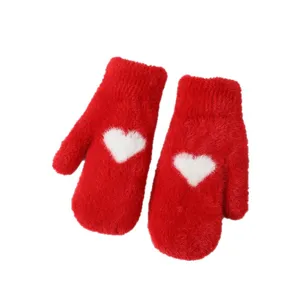 Cozy red fuzzy winter mittens for women with white heart, thick plush and warm lining.