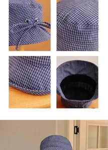 Vue rapprochée détaillée du chapeau bob à carreaux bleus montrant la texture du tissu.