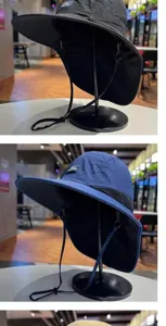 Outdoor sun protection fisherman hat detail, wide brim and neck flap, breathable mesh design.