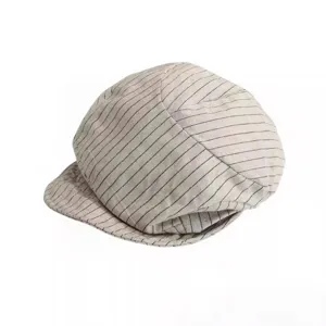 Detailed view of the striped cotton linen newsboy hat, showing fine texture and stitching.