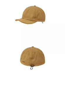 Detail view of khaki short brim baseball cap with adjustable back drawcord and soft brim design.
