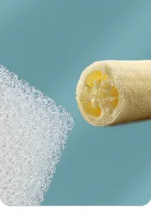 Close-up detail of kitchen cleaning sponge and natural plant fiber loofah for dishwashing.