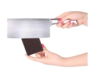 Carborundum cleaning sponge for kitchen pot and pan scouring, durable abrasive household tool.