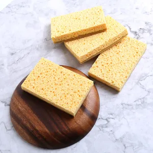Detail of dual-sided sisal wood pulp sponge kitchen cleaning pad for washing dishes.