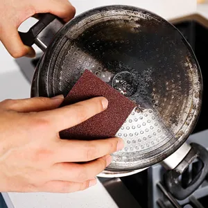 Diamond abrasive sponge pad for kitchen pots, heavy duty rust and burn removal cleaning tool.