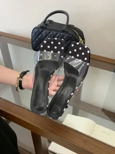 Chic polka dot transparent high heel sandals for women stylish summer fashion outdoor wear.