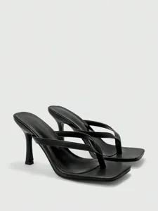Black square toe thong high heel sandal detail view, elegant evening party footwear style.
