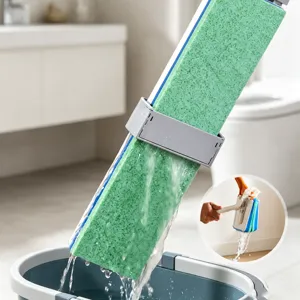 Hand-free flat mop with self-wringing bucket and absorbent sponge head for floor cleaning.