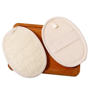 Natural loofah sponge pad for kitchen cleaning and dishwashing with convenient elastic hand strap.