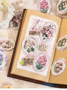 Paquet d'autocollants floraux gaufrés vintage pour journal intime DIY et scrapbooking décoratif.