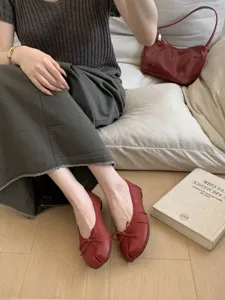Women's red split toe ballet flats with cute bow, soft leather casual flat shoes for daily wear.