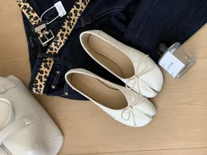 White soft leather split-toe ballet flats with cute bow, comfortable flat shoes for daily wear.