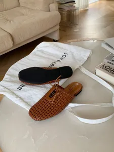Mules elegantes de cuero tejido con punta cuadrada zapatos planos, calzado casual refinado.