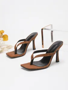 Detail view of brown square toe thong high heel mules for women elegant party shoes.