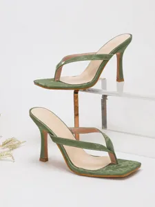 Stylish green stiletto thong sandals for women, elegant party and evening wear high heels.