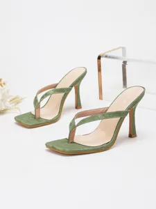 Detail view of elegant green women thong high heel sandals, perfect for party and casual wear.
