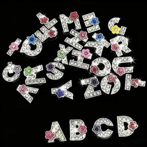 Silver rhinestone letter charms with colorful flower design for DIY jewelry making bracelets.