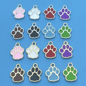Close-up of colorful enamel paw print metal charms, alloy DIY jewelry making accessories.