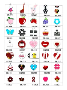 Detailed view of assorted enamel alloy charms, featuring cute shapes and metallic finishes.