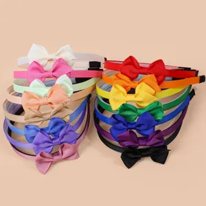 Cute grosgrain ribbon bow headband detail shot, sweet style hair accessories for girls and kids.