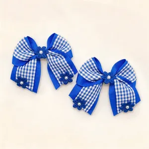 Blue and white checkered ribbon hair bow clip with adorable pearl flower accents for girls.