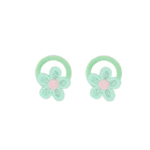 Close-up detail of cute green embroidered flower hair tie for kids, soft elastic rubber band.