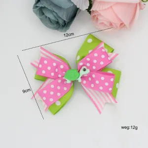 Kids polka dot bow hair clip with cute turtle pendant, colorful hair accessory for girls.