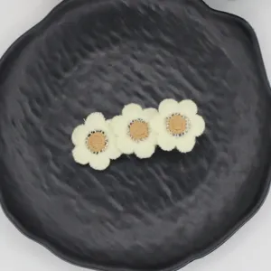 Kids embroidered flower hair clip, sweet cream daisy side clip for cute girls bang styling.
