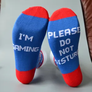 Casual cotton mid-tube socks with funny text knit on sole, comfortable daily wear.