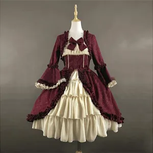 Victorian gothic dress detail showing intricate bell sleeves, ruffles, and bow decoration.