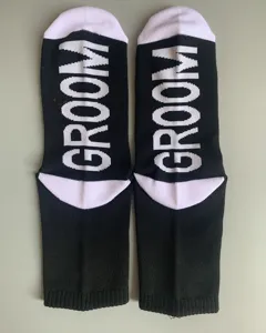 Groom wedding party socks black and white dress socks for men wedding celebration detail shot