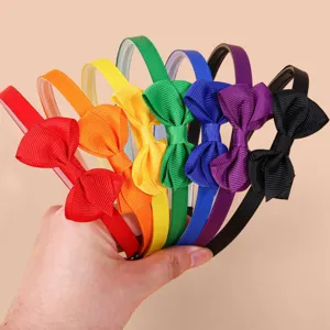 Grosgrain ribbon bow headband in vibrant multi-colors, sweet and stylish hair accessory.