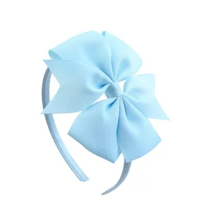 Light blue grosgrain ribbon swallowtail bow hairband detail, sweet and cute design for girls.