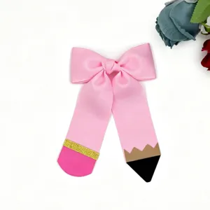 Pink pencil bow hair clip, cute grosgrain ribbon back-to-school hair accessory for girls.