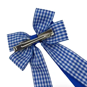 Blue and white gingham ribbon hair bow detail, metal clip design for sweet daily hairstyles.