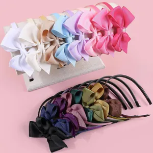 Children solid color grosgrain large bow headband detail view, multi-color hair accessory.