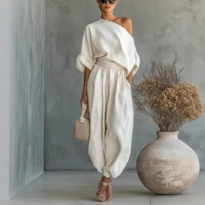 Elegant women off-shoulder top and loose trousers two-piece casual set for spring daily wear.