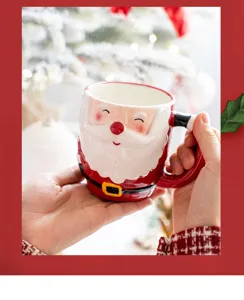 Christmas Santa Claus ceramic coffee mug, festive holiday gift table decor closeup view